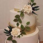 White Iced Flowers with Gold wedding cake